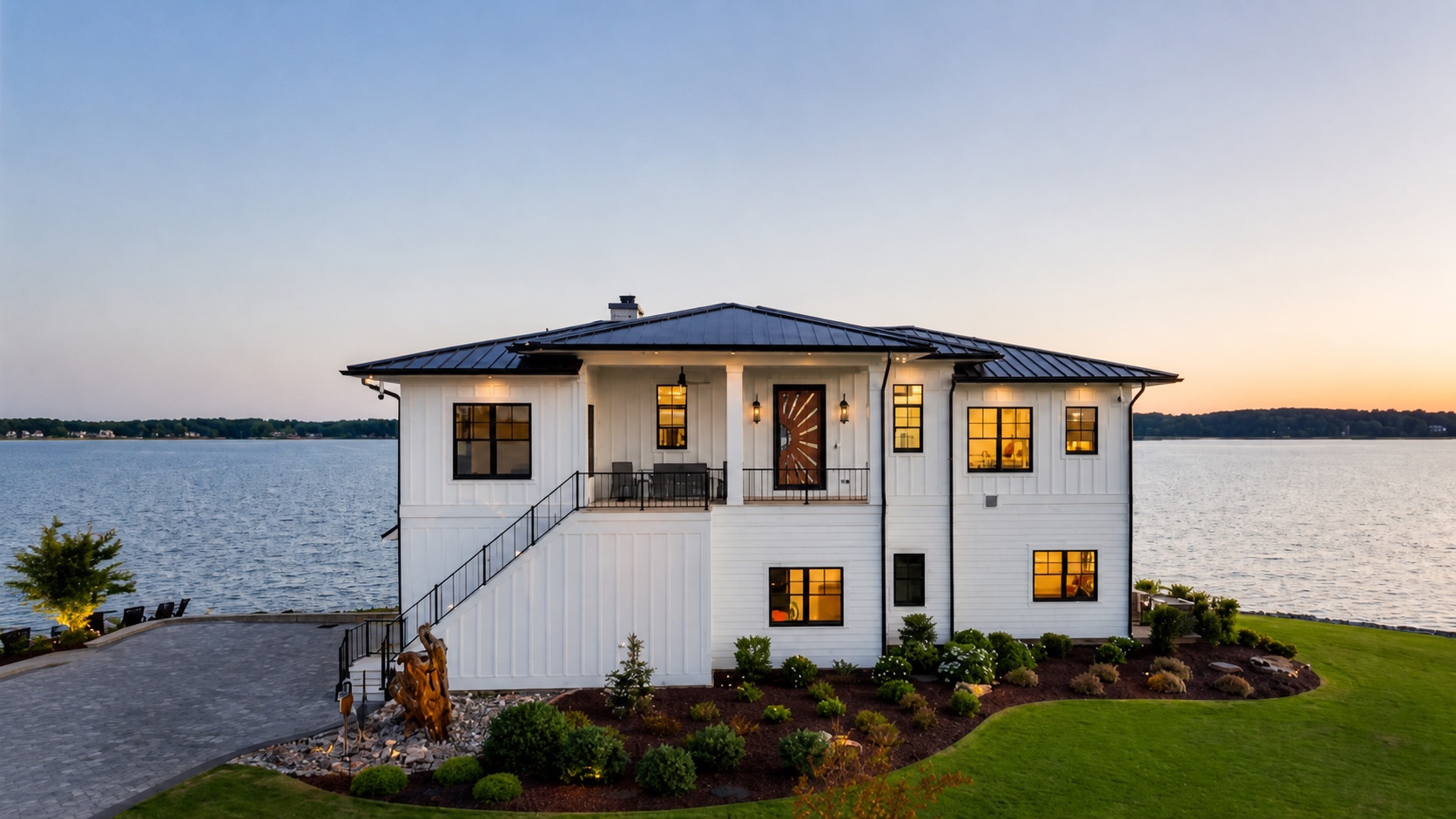Completed HTS lakefront residence at dusk